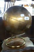 A TERRESTRIAL GLOBE, ON METAL STAND