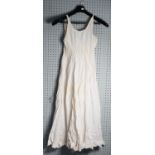 EARLY VICTORIAN PLEATED WHITE LAWN CHEMISE with narrow lace stripes decorating the bodice and