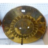 A MIDDLE EASTERN ENGRAVED BRASS CIRCULAR COFFEE TABLE TRAY TOP, WITH CENTRAL WELL, THE CENTRE AND