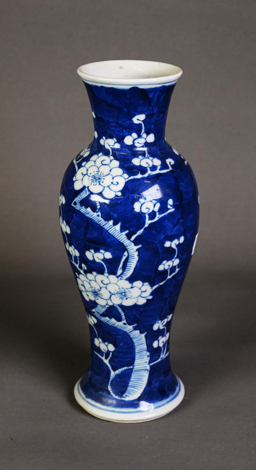 NINETEENTH CENTURY CHINESE BLUE AND WHITE PORCELAIN VASE, of slender baluster form, decorated with