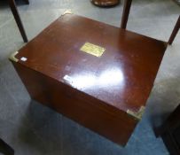 A LARGE STAINED WOOD HINGED TOP STORAGE BOX WITH BRASS CORNERS