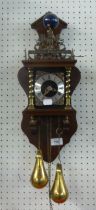 A MAHOGANY FINISH DUTCH WALL CLOCK