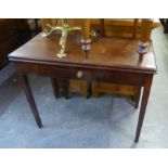 AN ANTIQUE MAHOGANY LARGE OBLONG FLAP-TOP TABLE