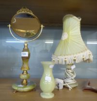 AN ONYX VANITY MIRROR ON STAND, AN ONYX TABLE LAMP AND SHADE AND AN ONYX SMALL VASE (3)