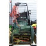 AN ATCO WINDSOR 14S SELF PROPELLED ELECTRIC CYLINDER LAWN MOWER AND GRASS BOX