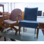 AN OAK FRAMED STURDY LOW SEATED NURSING CHAIR, AND ANOTHER OAK FRAMED LOW SEATED CHAIR (2)