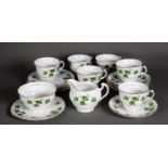 TWENTY ONE PIECE COLCLOUGH CHINA TEASET FOR SIX PERSONS, colour printed with trailing vines within