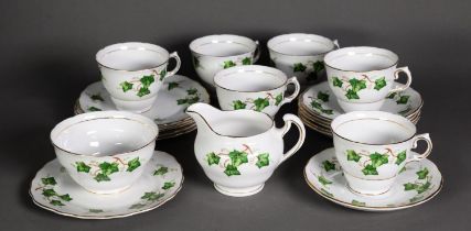 TWENTY ONE PIECE COLCLOUGH CHINA TEASET FOR SIX PERSONS, colour printed with trailing vines within