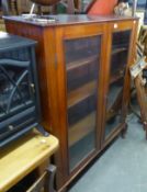 19TH CENTURY MAHOGANY BOOKCASE ENCLOSED BY TWO GLAZED DOORS, ON STUMP CABRIOLE SUPPORTS, THREE