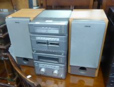 A SONY STACKING STEREO SYSTEM HAVING 5 CD CHANGER AND A PAIR OF SPEAKERS AND A MATSUI MIDI 85cd
