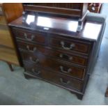 A MAHOGANY GEORGIAN STYLE SMALL CHEST OF TWO SHORT AND THREE LONG DRAWERS