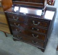 A MAHOGANY GEORGIAN STYLE SMALL CHEST OF TWO SHORT AND THREE LONG DRAWERS