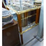 A LARGE RECTANGULAR GILT FRAME COFFEE TABLE, HAVING BEVELLED INSET GLASS AND A PAIR OF MATCHING