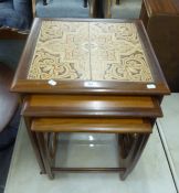 A G-PLAN NEST OF THREE COFFEE TABLES, THE TOP TABLE WITH TILE TOP (3)