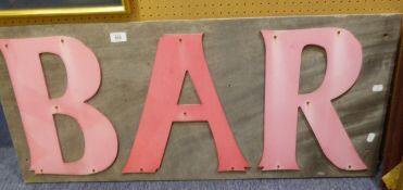 SIGNAGE; SCRATCH BUILT 'BAR' SIGN WITH FADED PINK LETTERING, 40" (101.5cm) wide