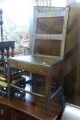 AN ANTIQUE OAK COUNTRY CHAIR, WITH PANEL SEAT
