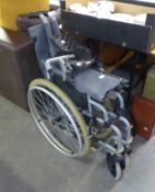 WHEELCHAIR, FOLDING WITH FOOTREST AND HAND RAILS