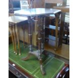 AN OCTAGONAL OAK OCCASIONAL TABLE, ON THREE LEGS AND TRIPOD SUPPORTS