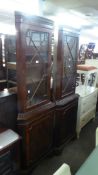 A PAIR OF MAHOGANY DOUBLE CORNER CUPBOARDS