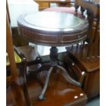 REGENCY STYLE MAHOGANY CIRCULAR DRUM TOP OCCASIONAL TABLE WITH GREEN LEATHER SKIVER AND TWO DRAWERS,