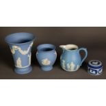 FOUR PIECES OF WEDGWOOD BLUE JASPERWARE, comprising, a DARK BLUE DIPPED CIRCULAR SMALL BOX AND