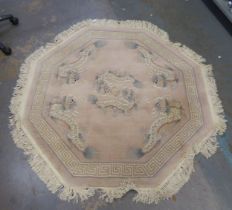 OCTAGONAL CHINESE RUG, WITH DRAGON PATTERN AND A SMALLER RECTANGULAR BLUE RUG WITH ROSE PATTERN