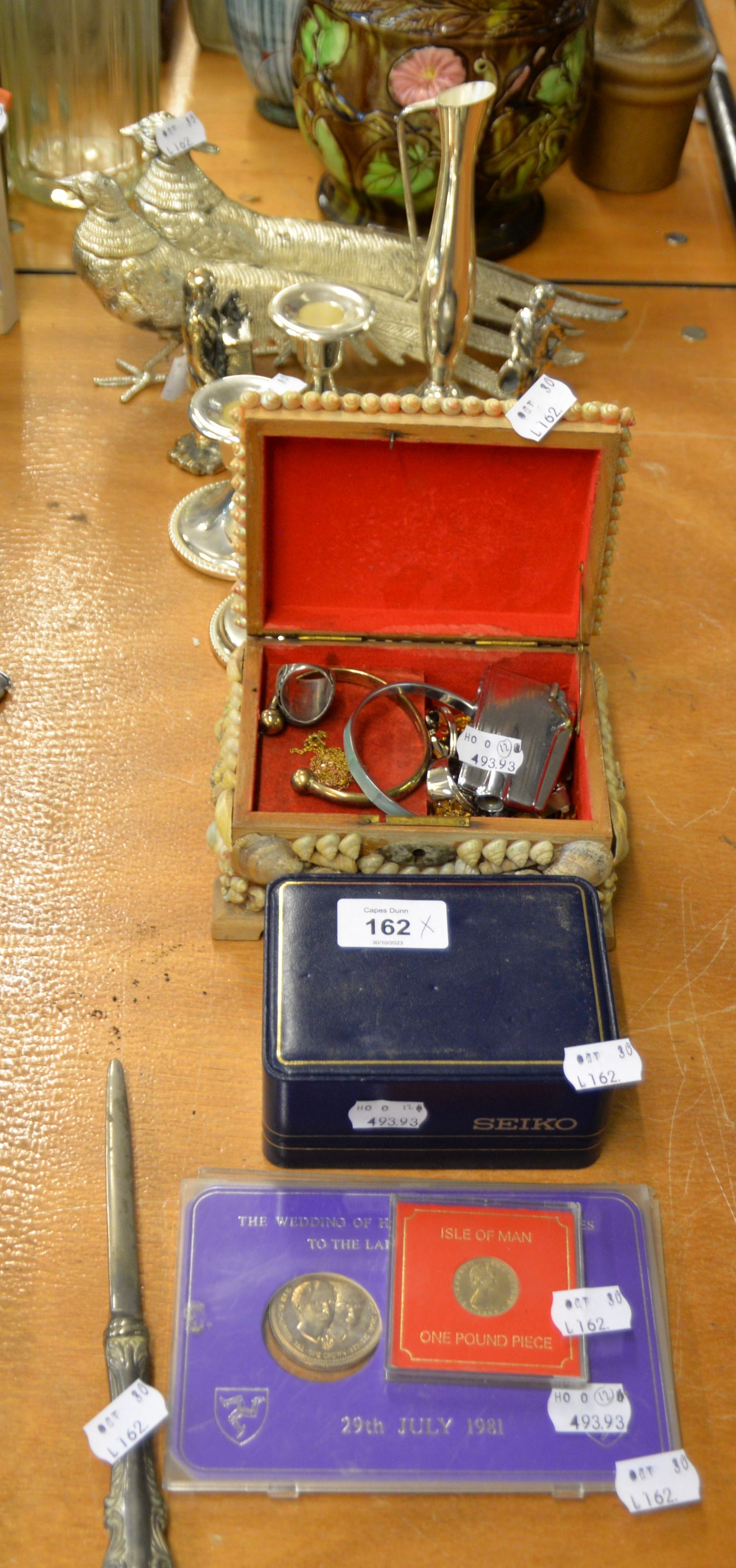 A SILVER BANGLE, A SILVER RING WITH RED STONE, A COMMEMORATIVE TWO COINS SET, FOR THE WEDDING OF HRH