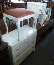 A CREAM FINISH CHEST OF THREE LONG DRAWERS; MATCHING BEDSIDE CHEST AND A TRIPLE MIRROR AND