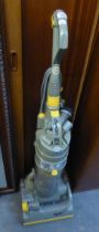 A DYSON DC04 UPRIGHT VACUUM CLEANER AND AN IRONING BOARD (2)