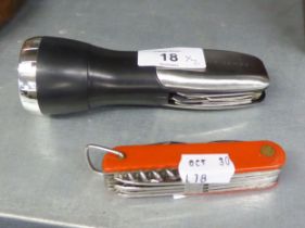 CLIFFORD JAMES HAND TORCH, THE HANDLE AS MULTI-BLADED POCKET KNIFE AND A SWISS ARMY KNIFE (2)