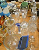 FIVE CUT GLASS DECANTERS, A CUT GLASS CLARET JUG, TWO GLASS CELERY VASES, WINE GLASSES, EGG SHAPED