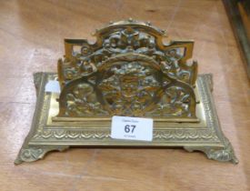 A CAST BRASS LETTER RACK