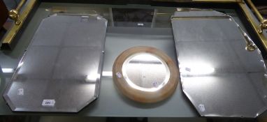 TWO FRAMELESS BEVELLED EDGE WALL MIRRORS AND A MARBLE CIRCULAR WALL MIRROR (3)