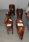 FIVE AFRICAN BROWN HARD WOOD MODEL OF ANIMALS, VIZ TWO ELEPHANTS, A RHINO, AN ANTELOPE AND A BIRD (