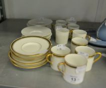 TEN LIMOGES WHITE CHINA COFFEE CANS AND SAUCERS (TWO SHAPES) (20)