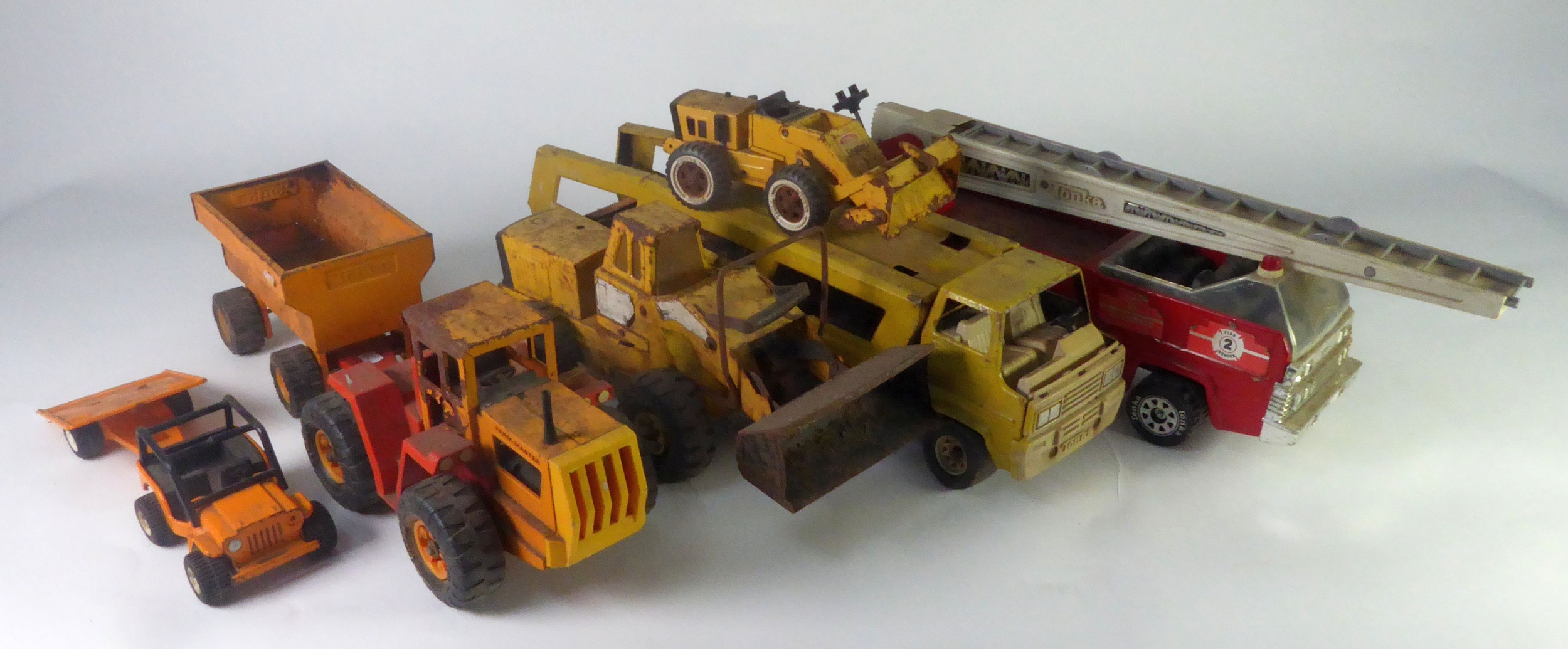 TONKA: Vintage Tonka XR101 Transporter, Fire 2 Rescue, and a Farm Master and trailer, plus smaller
