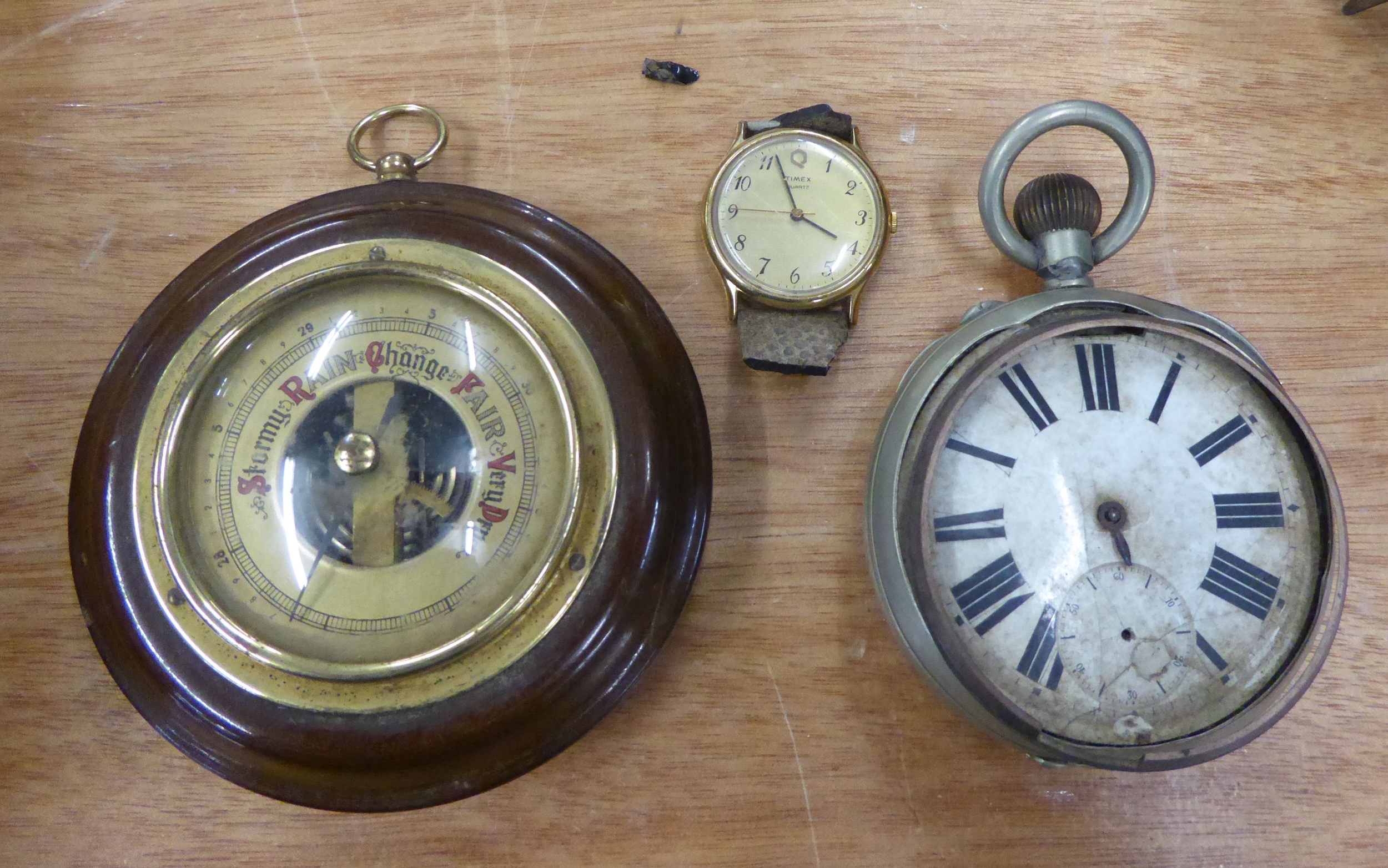 A JUMBO POCKET WATCH WITH KEYLESS MOVEMENT, IN METAL CASE (DISTRESSED); TIMEX QUARTZ WRISTWATCH IN