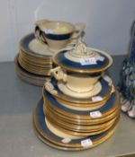 BURLEIGH WARE POTTERY PART DINNER SERVICE, WITH SPONGED BROAD BLUE BORDERS WITH GILT PATTERNED