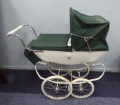 SILVER CROSS LARGE, DOLL'S PRAM, with white enamelled coach work, dark green canvas cover, hood