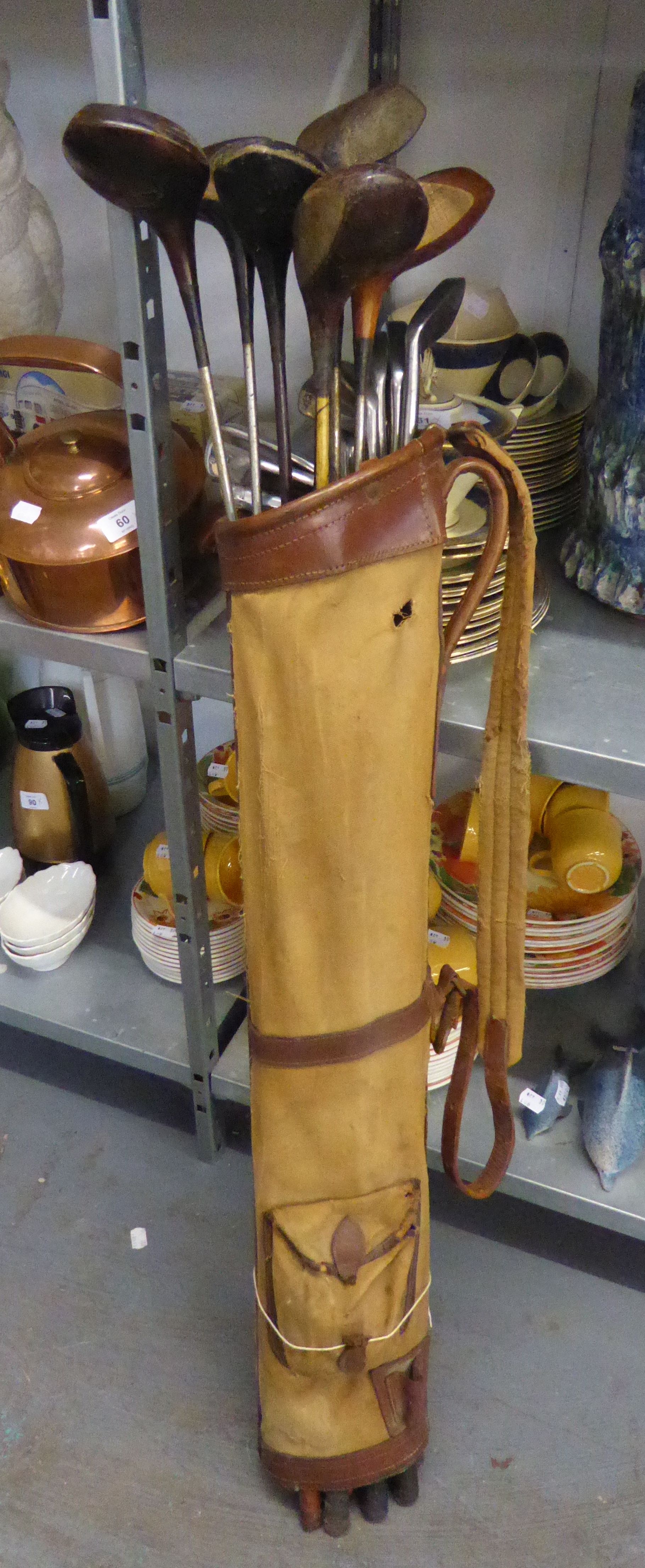 VINTAGE GOLF CLUBS, WOODEN AND METAL SHAFTS AND HEADS IN A CLOTH AND LEATHER BAG. TOGETHER WITH - Image 2 of 2