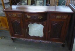 A VICTORIAN MAHOGANY DRESSER, HAVING THREE DRAWERS OVER THREE CUPBOARDS, WITH CARVED DECORATION