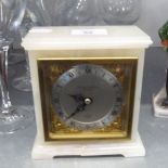 ELLCOTT MANTEL CLOCK WITH MECHANICAL MOVEMENT, BRASS AND SILVERED ROMAN DIAL, IN WHITE ONYX