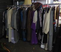 A GOOD SELECTION OF VINTAGE CLOTHING AND COATS, TO INCLUDE; A BLACK COCKTAIL DRESS, A STYLISH WOOL