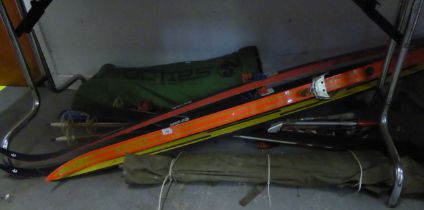 SPORTS EQUIPMENT; COLLECTION OF VINTAGE AND LATER SKIS AND POLES PLUS SAILBOARD SAIL AND RUDDER,