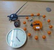 1960’S STYLE SUNBURST ORANGE WALL CLOCK AND TWO OTHER WALL CLOCKS (3)