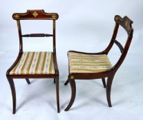 SET OF FOUR 19TH CENTURY REGENCY STYLE DINING CHAIRS, with gilt brass mounts and with pin-stuff