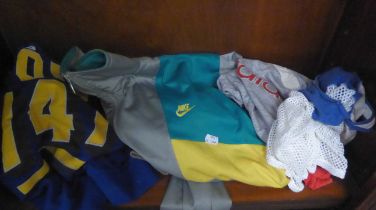 LYONS 747 SPORT SHIRT; ADIDAS SPORT SHIRT AND A RUNNER’S VEST