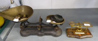 A SET OF VINTAGE KITCHEN SCALES AND WEIGHTS AND A SET OF SMALL POST OFFICE SCALES AND WEIGHTS