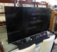 A SAMSUNG 49" FLAT SCREEN TV, MODEL UE49 NU8000T AND A SAMSUNG SOUND BAR, MODEL HW-560T (2)