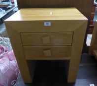 AN 'OAK FURNITURE LAND', TWO DRAWER BEDSIDE CHEST